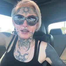 Young woman with facial tattoos, piercings confronts TJ Maxx employees after she was denied a job